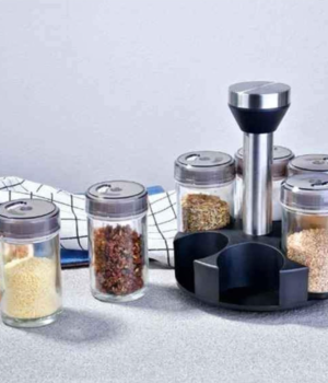 6 spice jars and a rotating stand